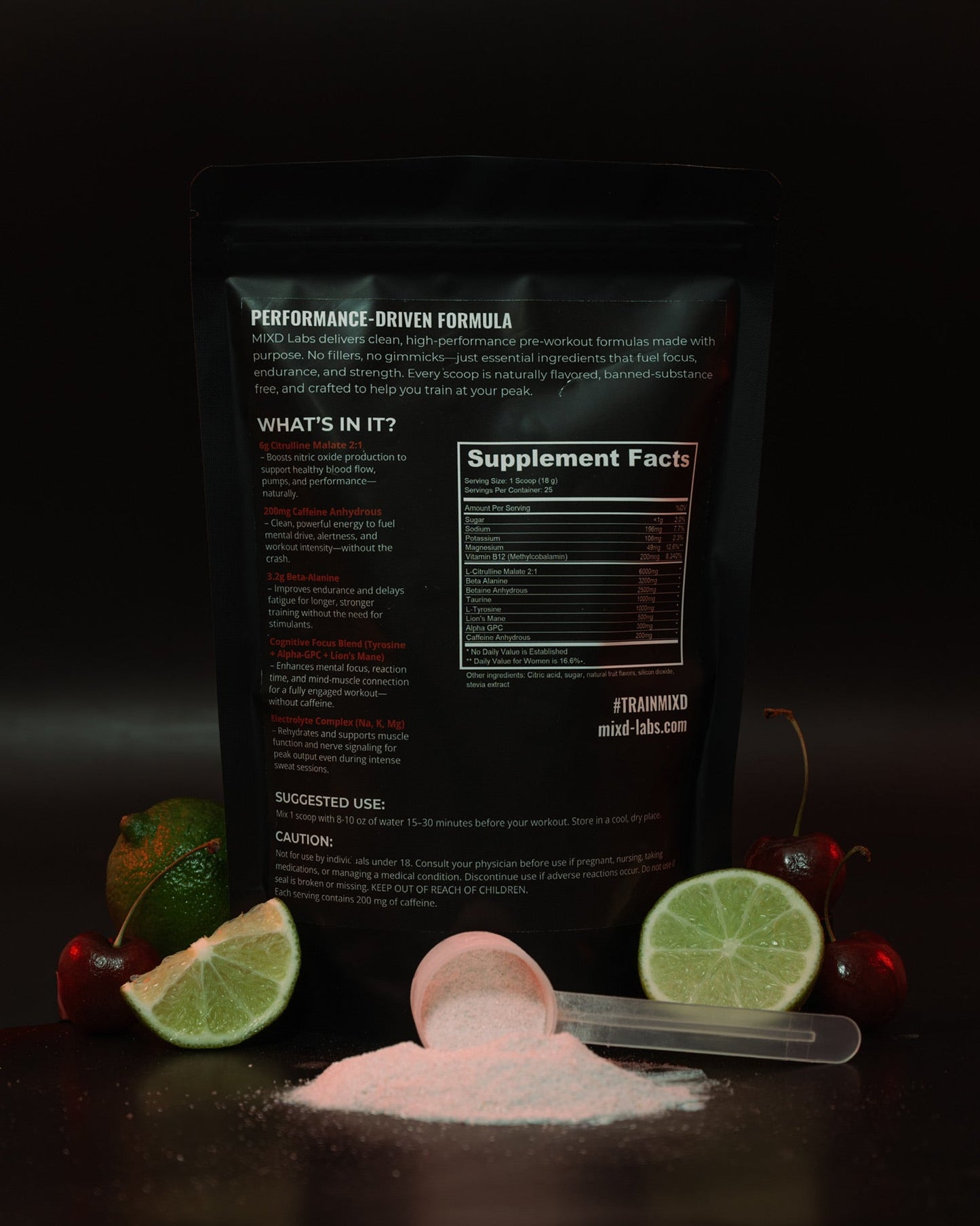 Supplement package with lime slices and a scoop of powder on a dark background