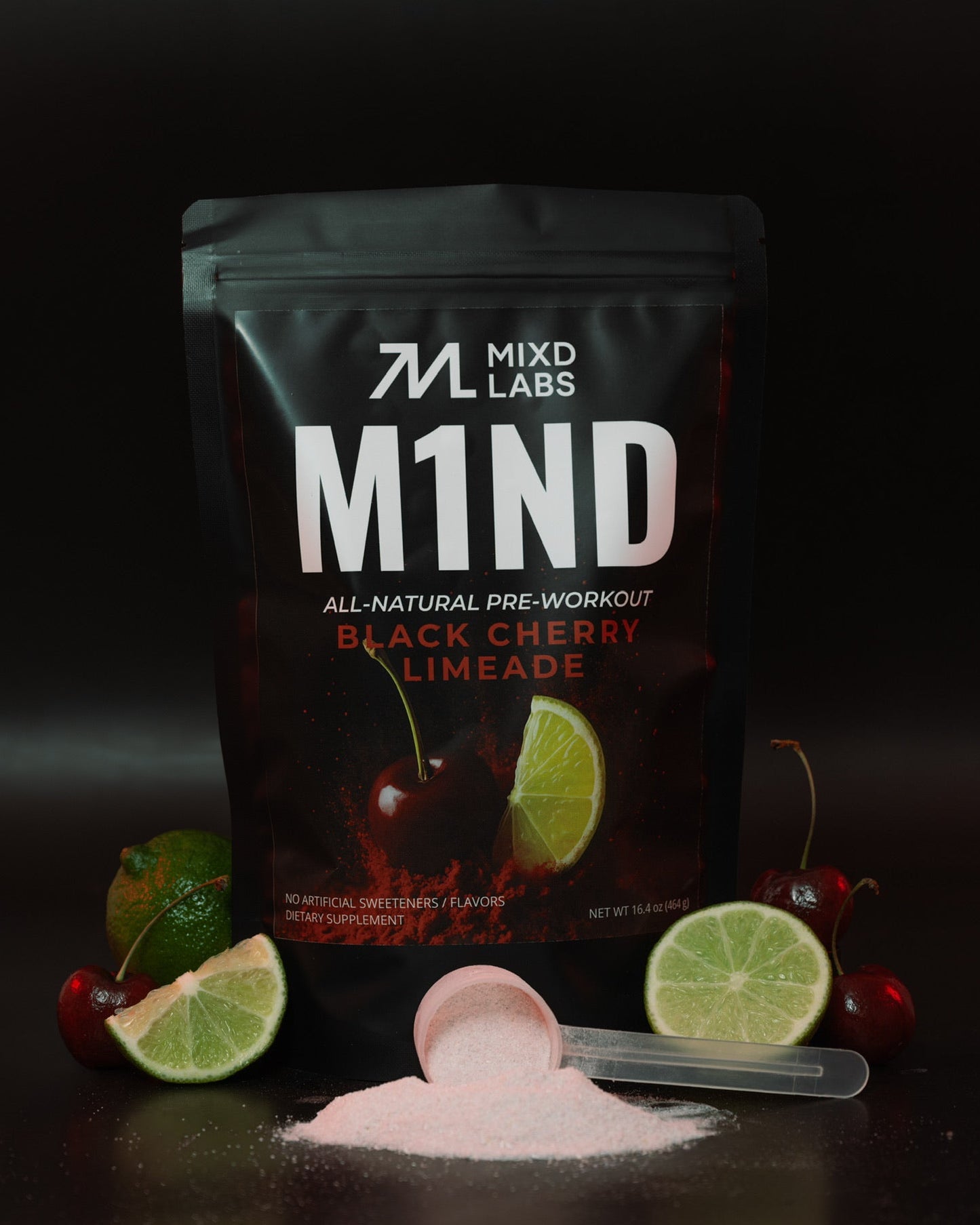 M1ND pre-workout supplement packaging with black cherry limeade flavor on a dark background.