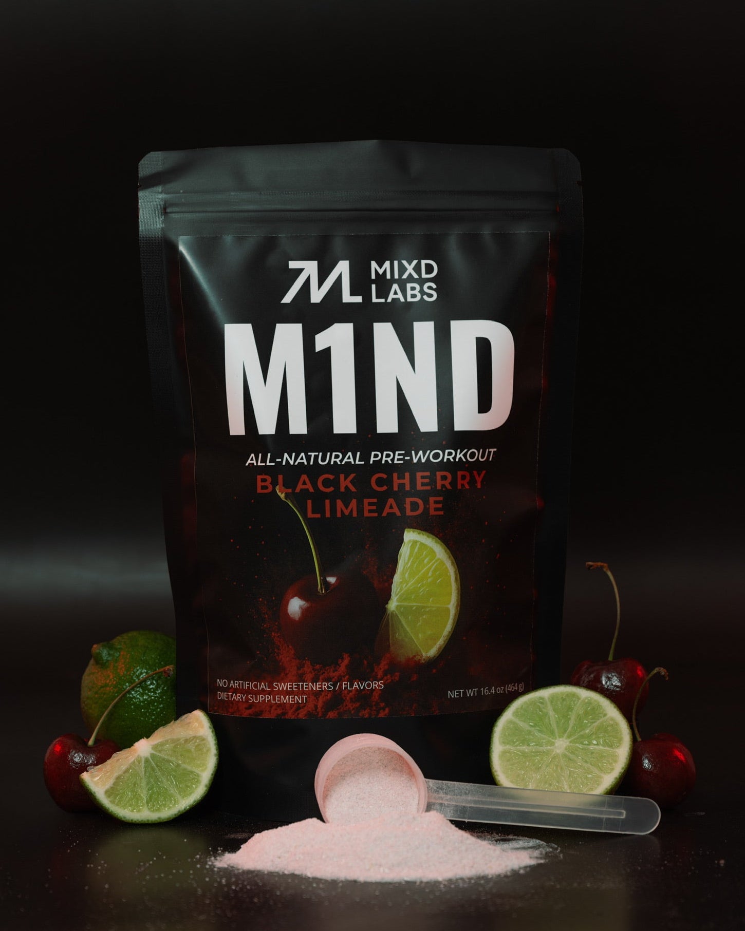 M1ND pre-workout supplement packaging with black cherry limeade flavor on a dark background.
