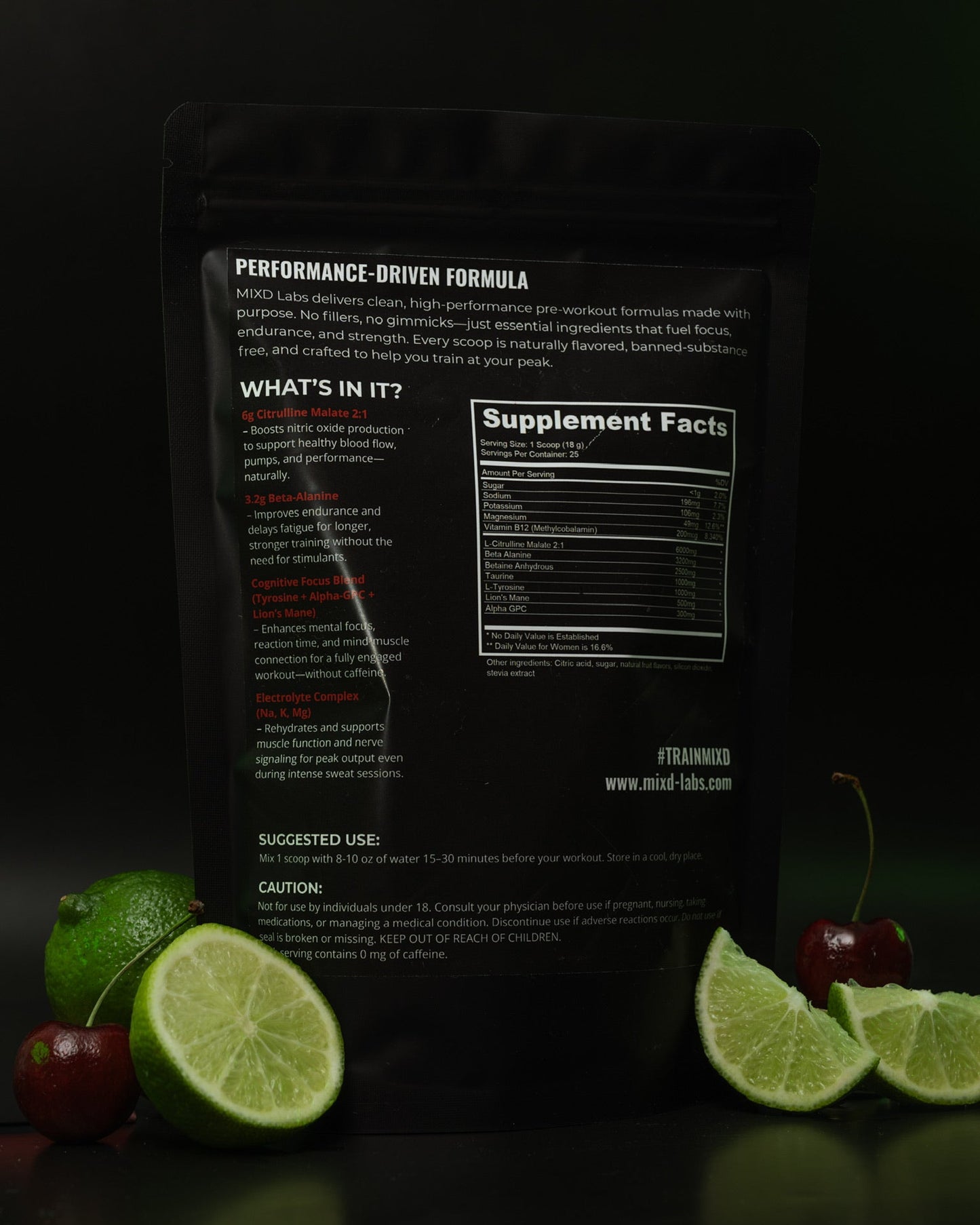 Black supplement package with lime and cherry on a dark background
